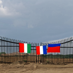 **

*   **Prompt:** Border fence, Czech and Hungarian flags, debate, migration crisis, EU flags in background, tense atmosphere.

**